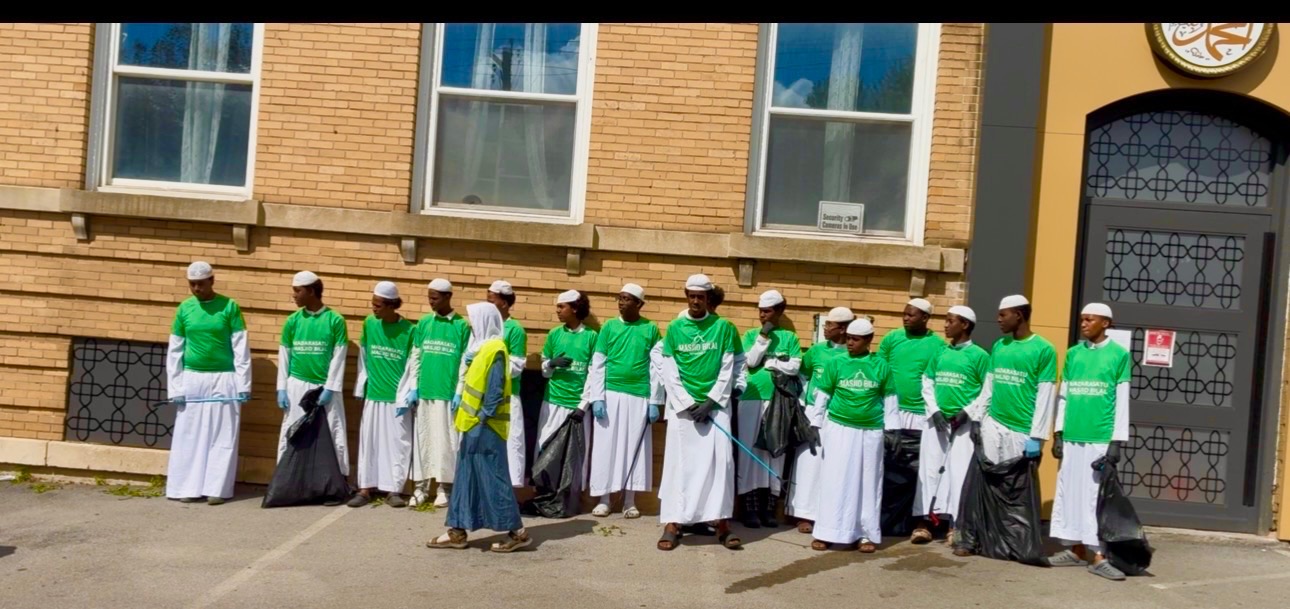 Masjid Bilal youth lined up before heading out for the neighborhood clean-up