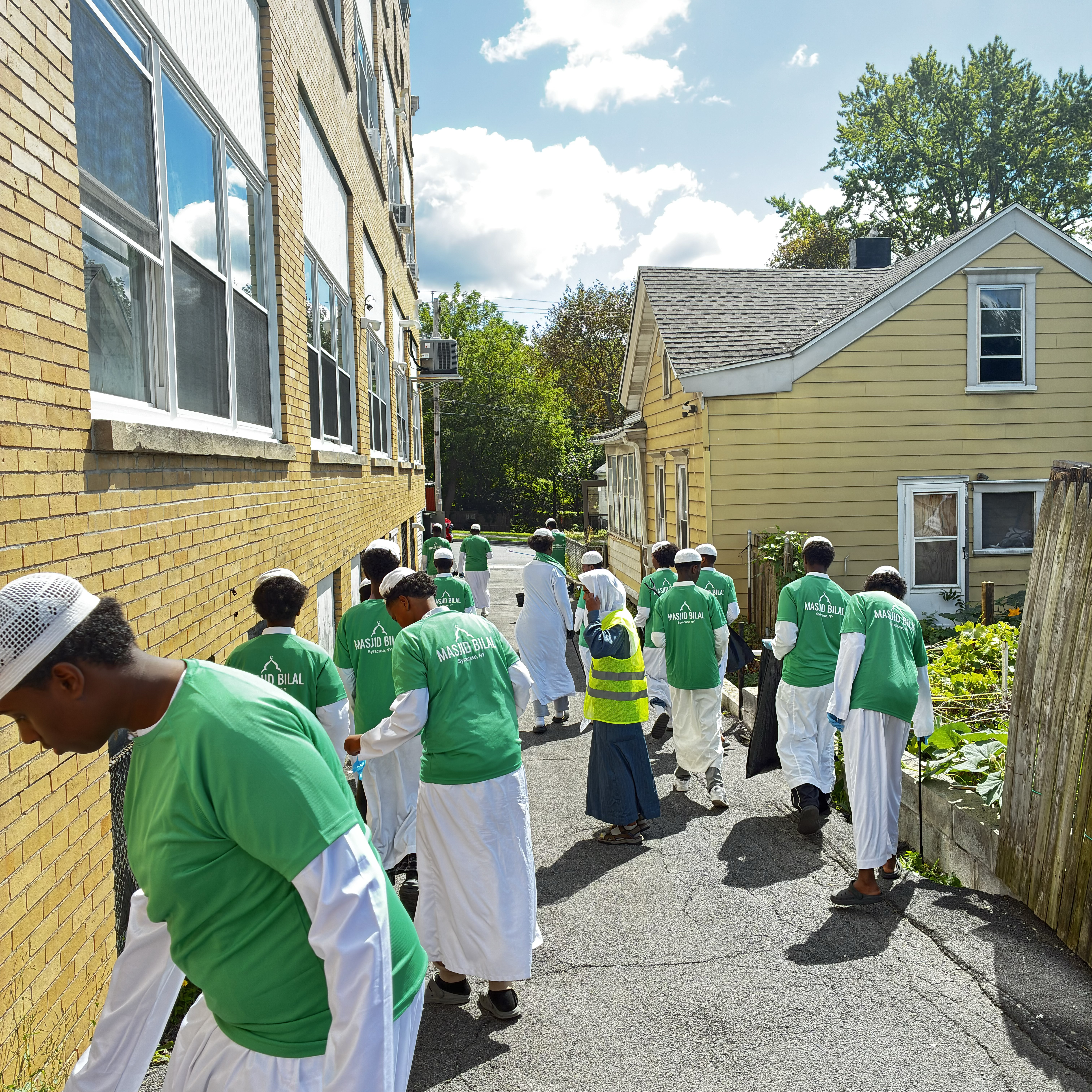 Masjid Bilal students walking through the neighborhood during the clean-up