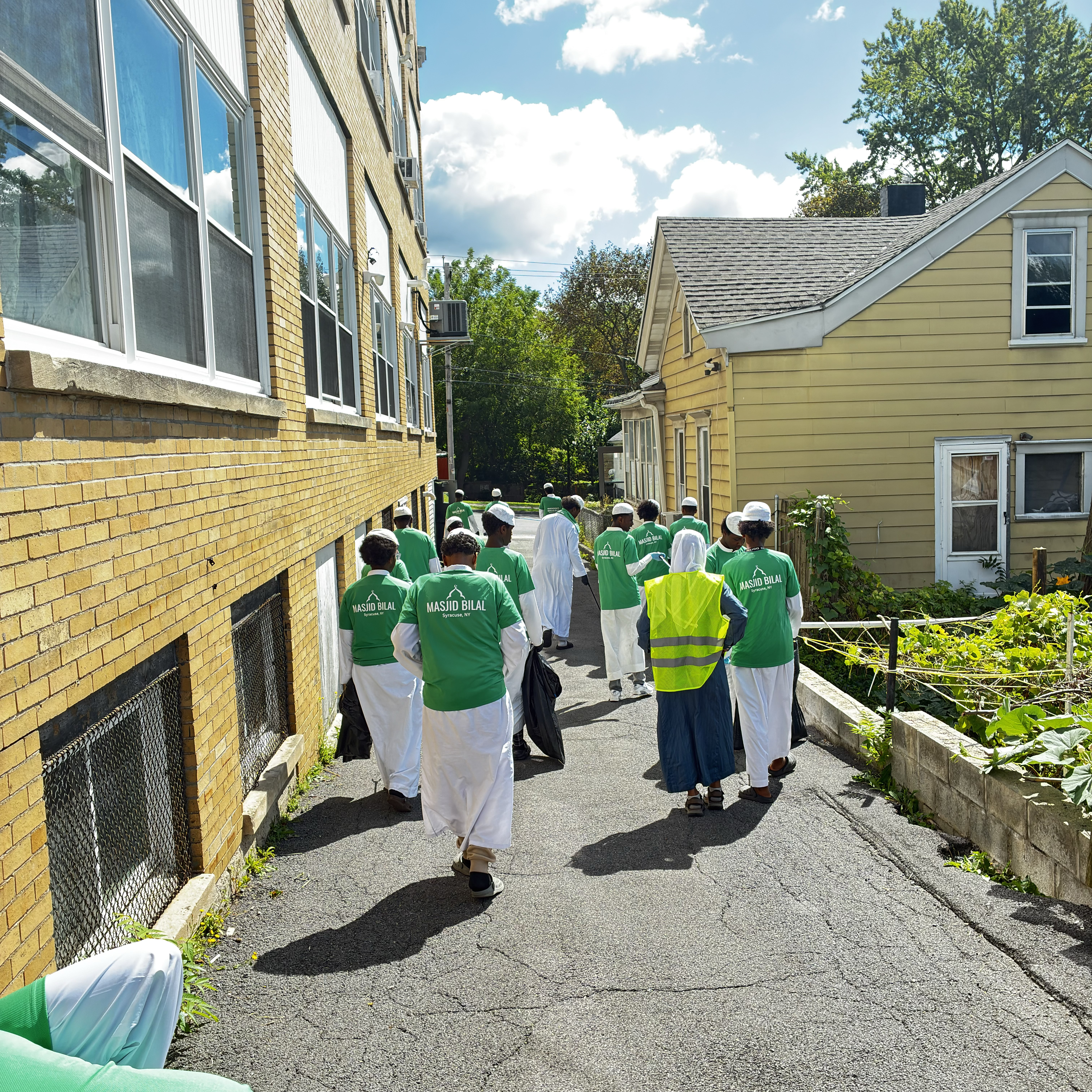 Masjid Bilal youth continuing the clean-up through the neighborhood